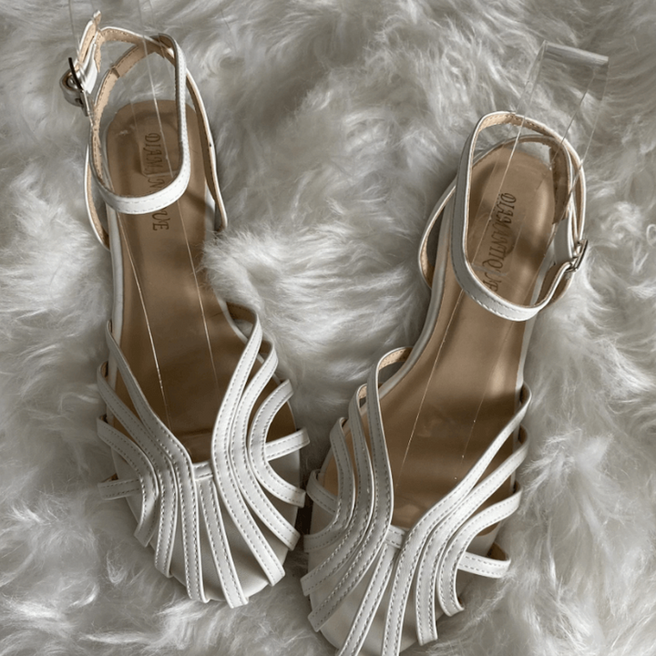 SOLE | Eleganti sandali piatti intrecciati per un look sofisticato